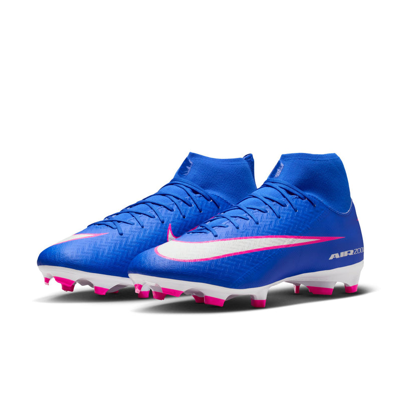 Pair of blue high-top soccer cleats with pink accents, white swoosh, and pink/white FG/MG studs.