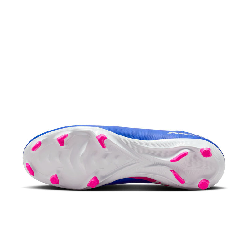 Outsole view of blue soccer cleats with pink studs on white base, FG/MG style.