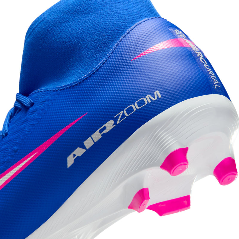 Close-up side of blue soccer cleat with Air Zoom graphic and pink studs on white outsole.