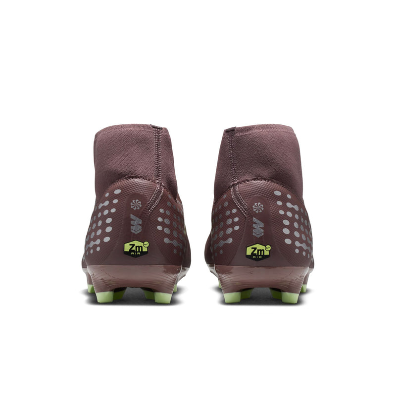 Back view of plum soccer cleats with dot pattern and neon green studs