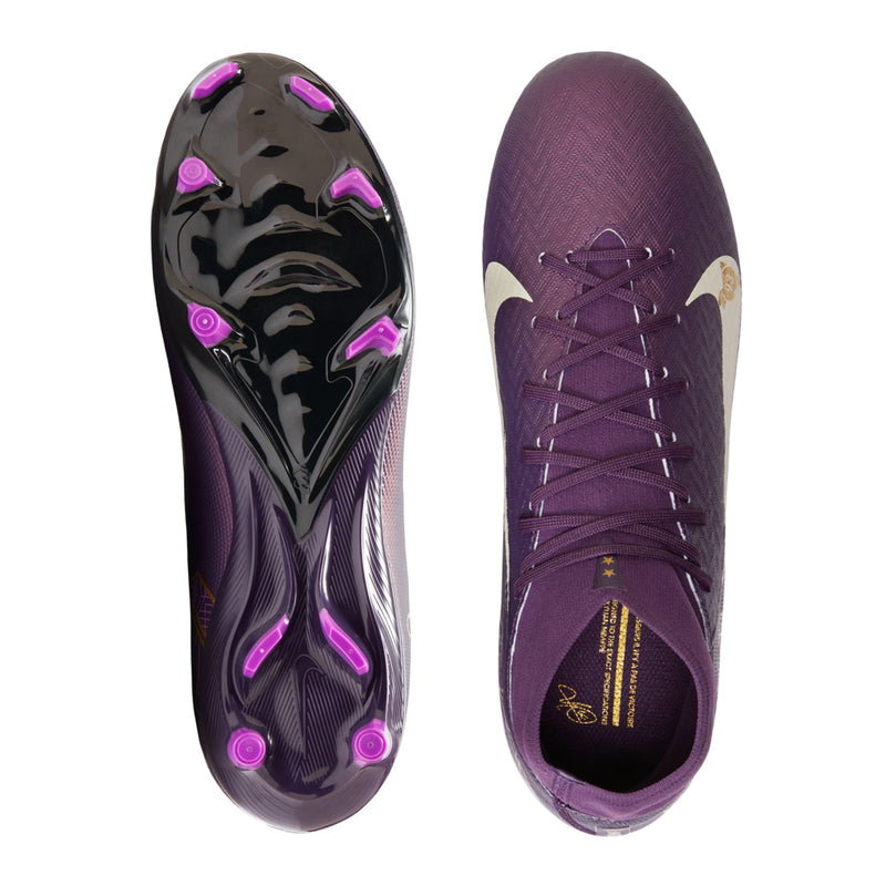 Men's purple soccer cleat outsole and heel view with molded studs and graphic plate