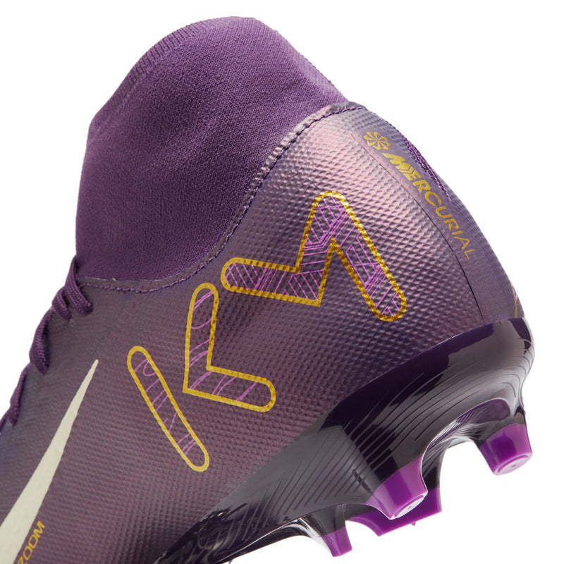 Men's purple soccer cleat with raised yellow outline graphics and textured upper