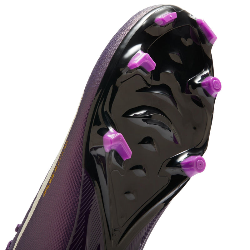 Men's soccer cleat sole plate with black finish and purple-tinted molded studs
