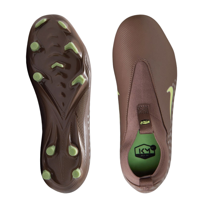 Youth soccer cleat outsole and interior view, plum with green studs and heel label
