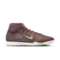 Men's high-top soccer cleat in plum, with neon green swoosh and white stud sole.