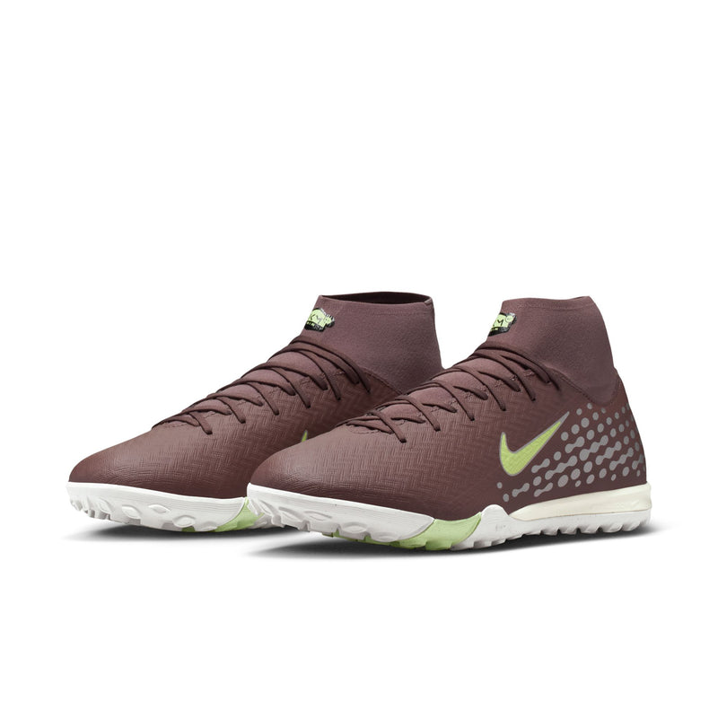 Men's high-top TF soccer cleat, plum upper with neon green accents and white outsole.