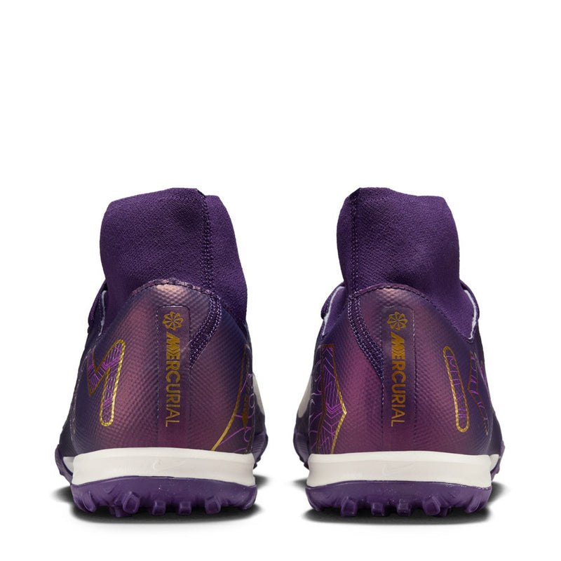 Men's purple TF football boots, heel back view with white sole and lace panel