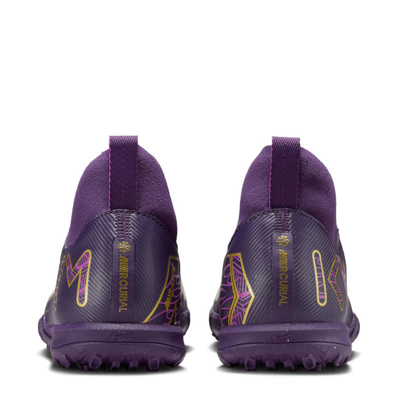 Youth purple TF soccer cleats, gold heel accents, molded turf studs outsole.