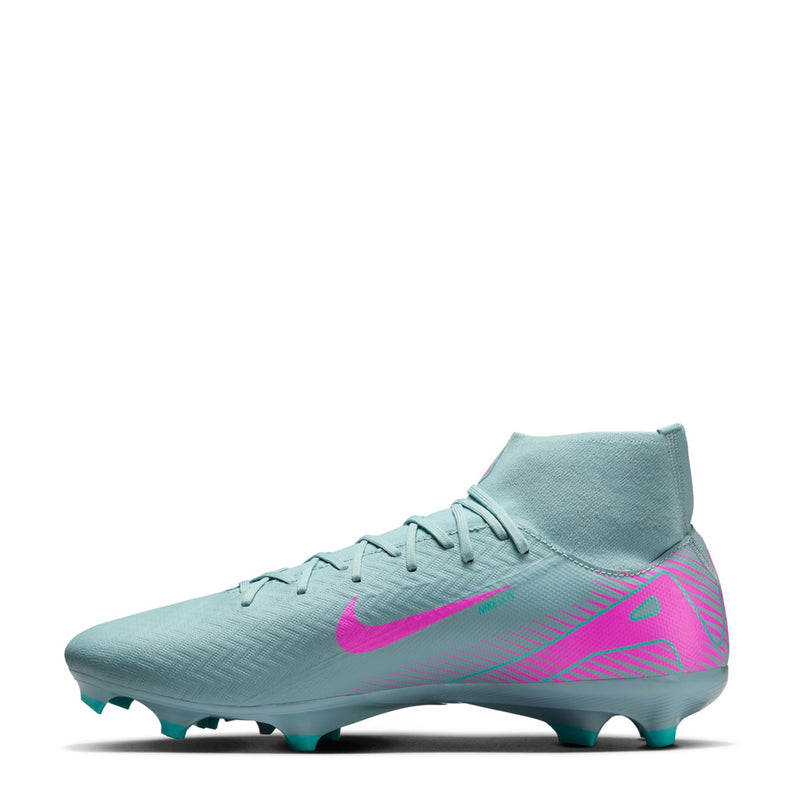 Light blue and pink men’s mid-top soccer cleat, teal studs on outsole