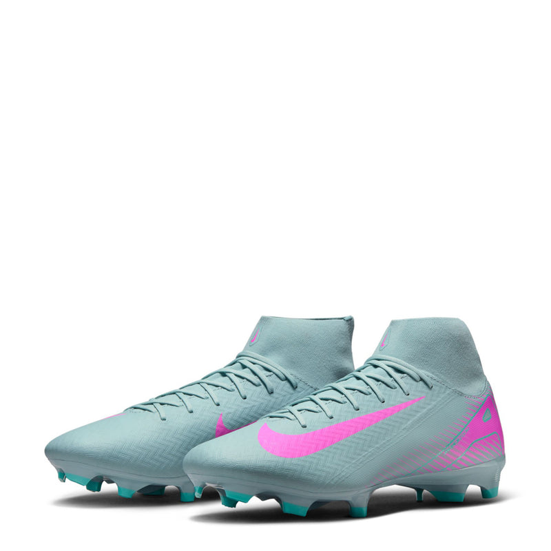 Light blue men’s soccer cleat with pink accents and teal stud pattern