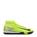 Neon green Nike Mercurial turf soccer cleat with black Swoosh and studded outsole