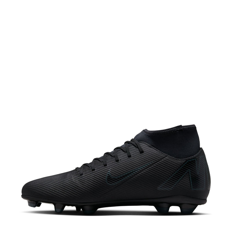 Black mid-cut soccer cleats with teal detailing and firm-ground outsole