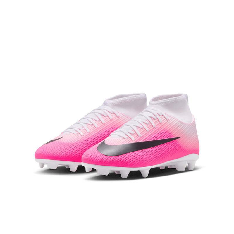 Youth soccer cleats in pink and white with black Swoosh and molded grass/ground studs