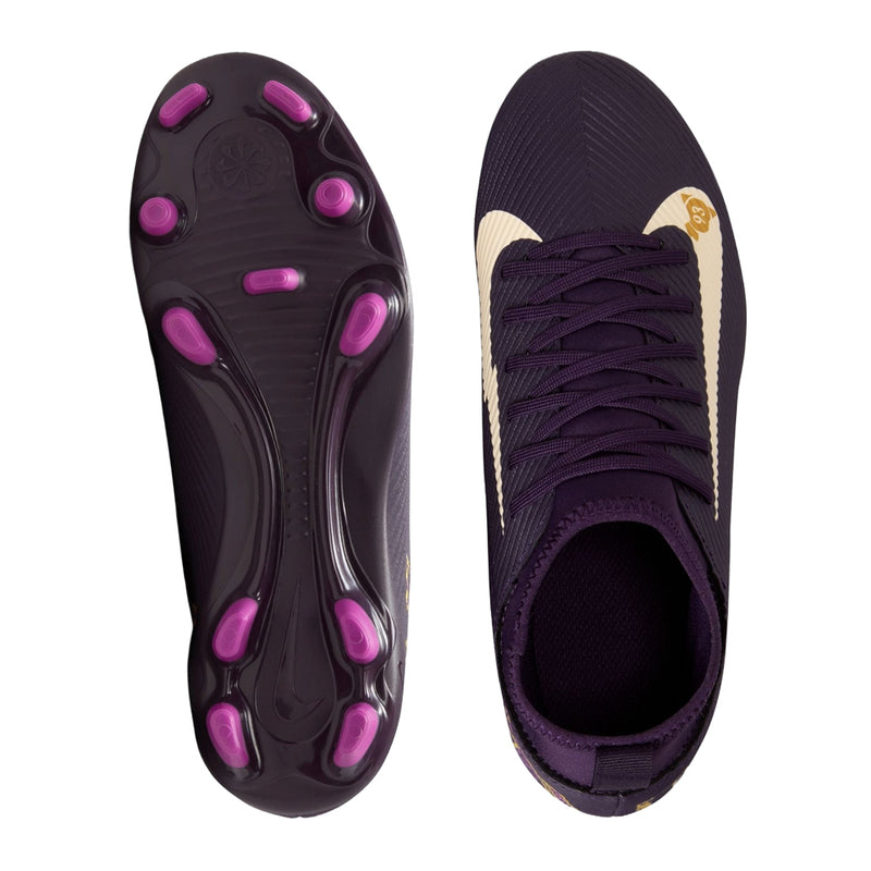 Youth purple soccer cleat outsole with pink studs and side profile lace-up upper