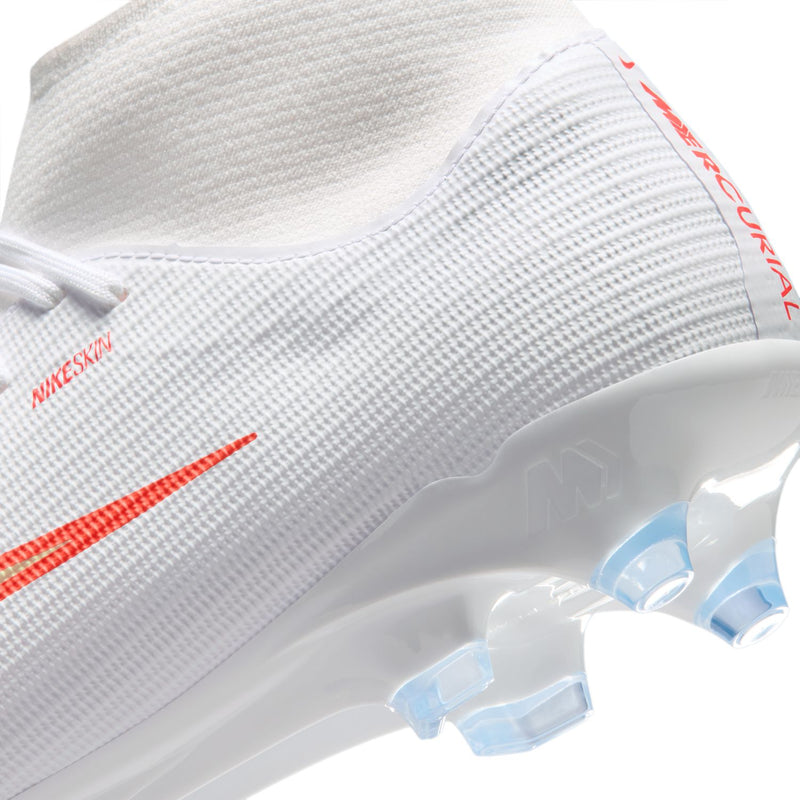 Close-up of men's white textured upper with red side stripe and outsole edge