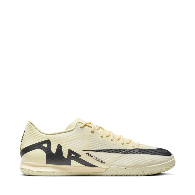 Men's cream soccer cleats with black Swoosh and lace-up front
