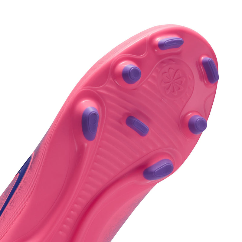 Youth soccer cleats bottom view, pink outsole with molded studs for traction