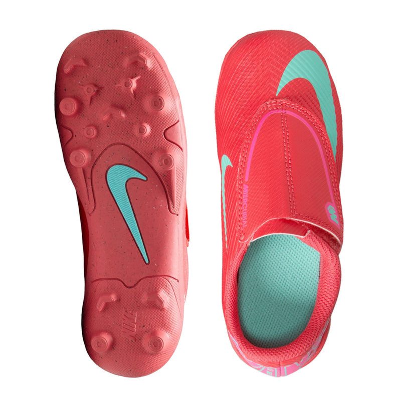 Kids red cleat outsole view with teal logo, studded traction pattern