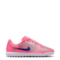Youth low-cut turf soccer cleat, pink upper with dark blue swoosh and lace-up front.
