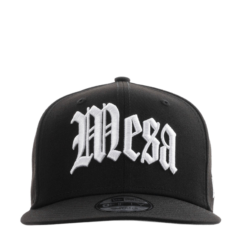 Black baseball cap with white front logo and curved brim