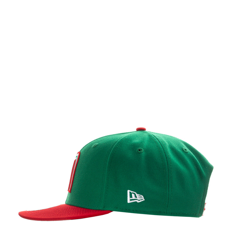 Green baseball cap with New Era logo and red brim, side view