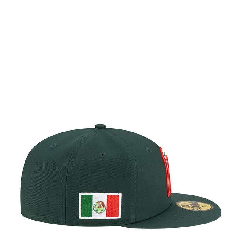 Dark green baseball cap with Mexico flag patch on front side and red stitch