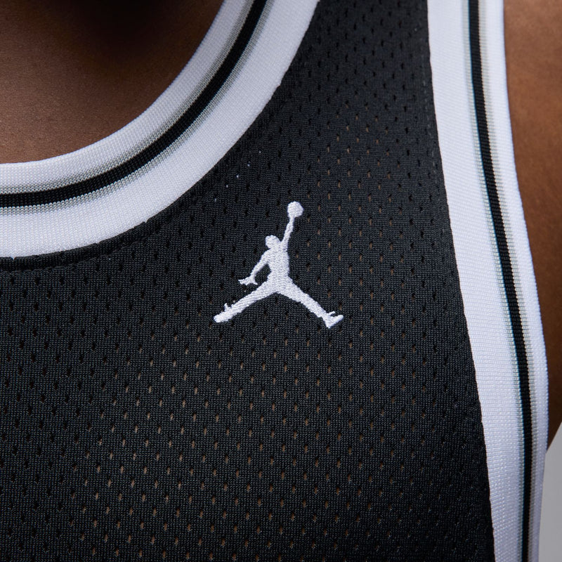 Men's black mesh jersey with white Jumpman logo on chest