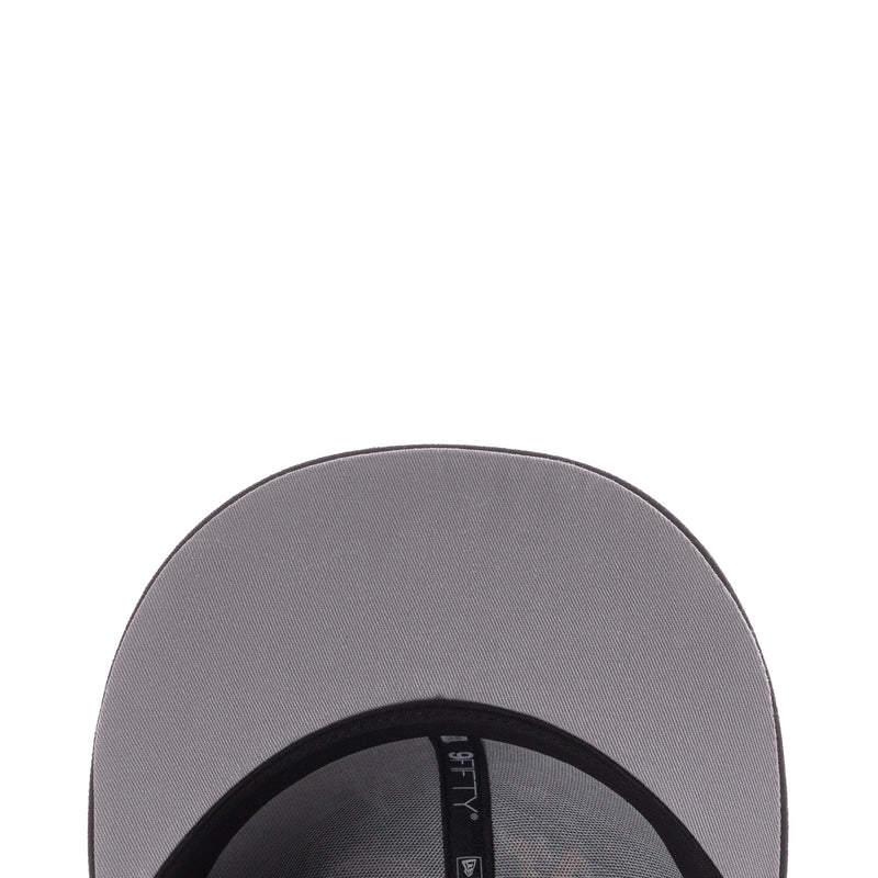 Baseball cap interior view with gray underside and black adjustable strapback