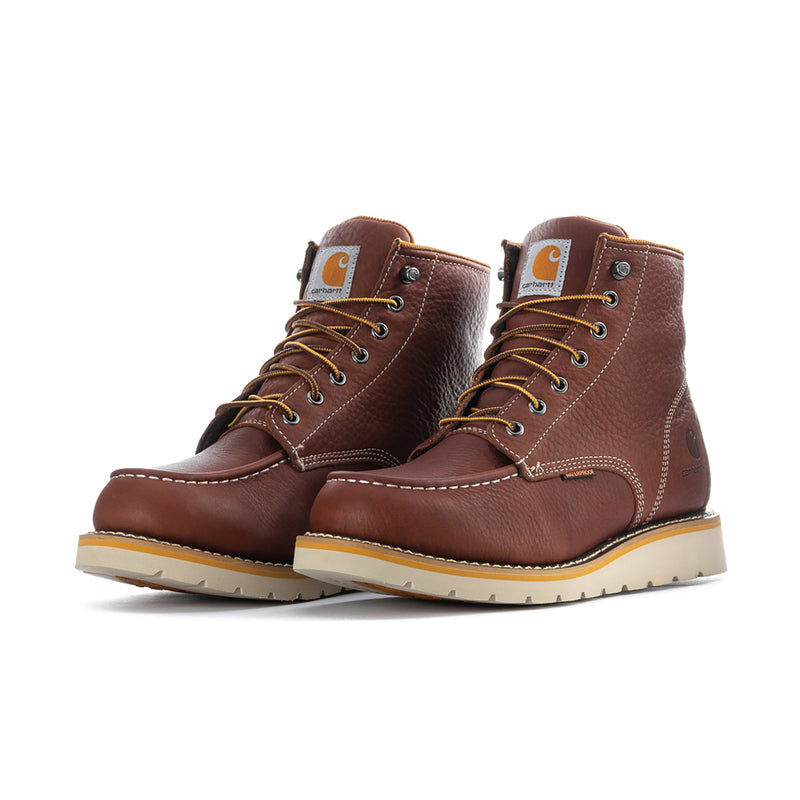 Pair of men's brown moc-toe 6" lace-up waterproof boots, angled side view