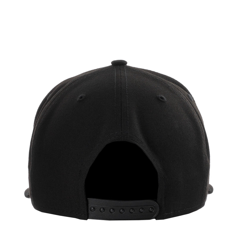 Black baseball cap with snapback strap, eyelets, and curved brim