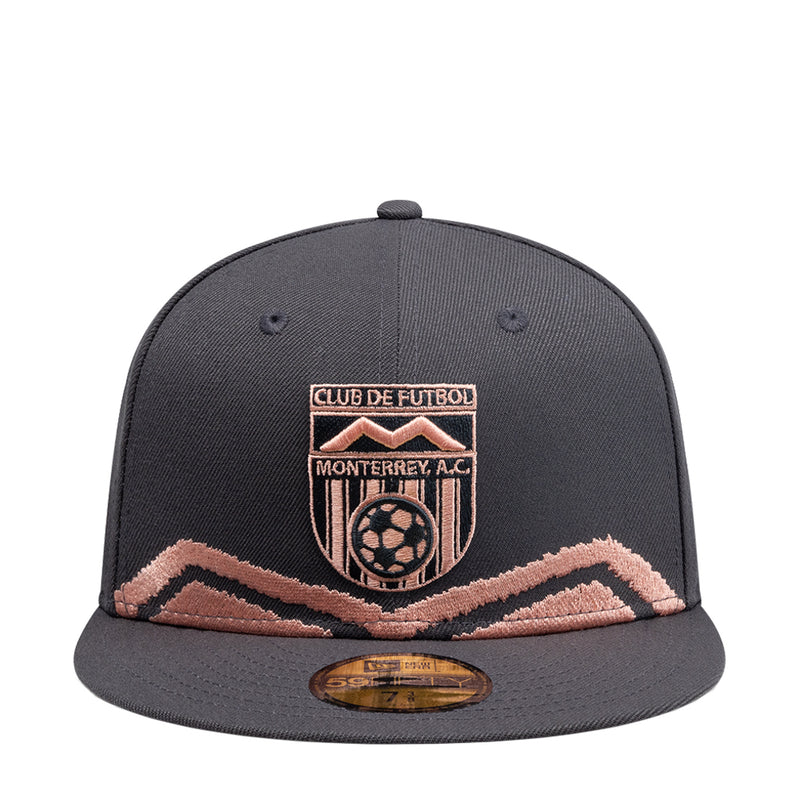 Dark grey snapback cap with embroidered crest logo and coral mountain graphic.