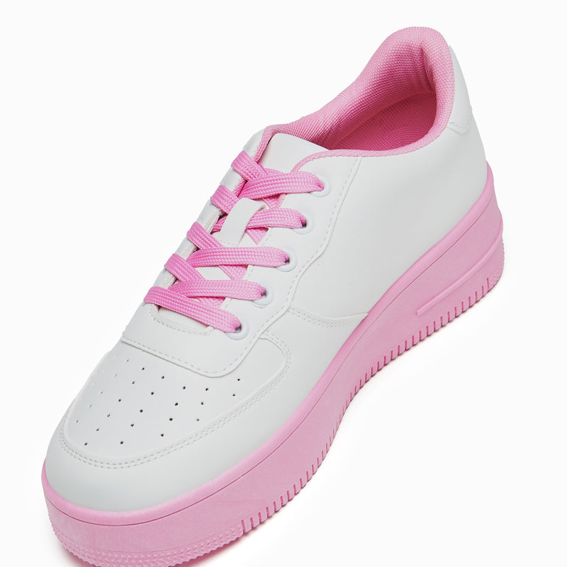 A pair of white platform trainers with pink floral embroidery on the top and a pink sole - inside view