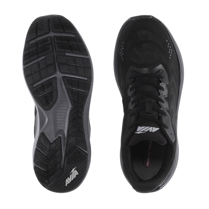 Men's black shoe soles and insides, showing treaded outsole and lace opening