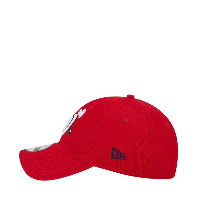 Kids red baseball cap with New Era logo on side and small decorative prints
