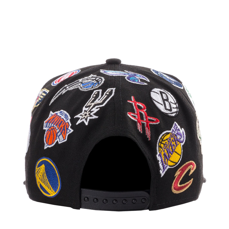 Black cap back with embroidered NBA team patches and adjustable snapback strap