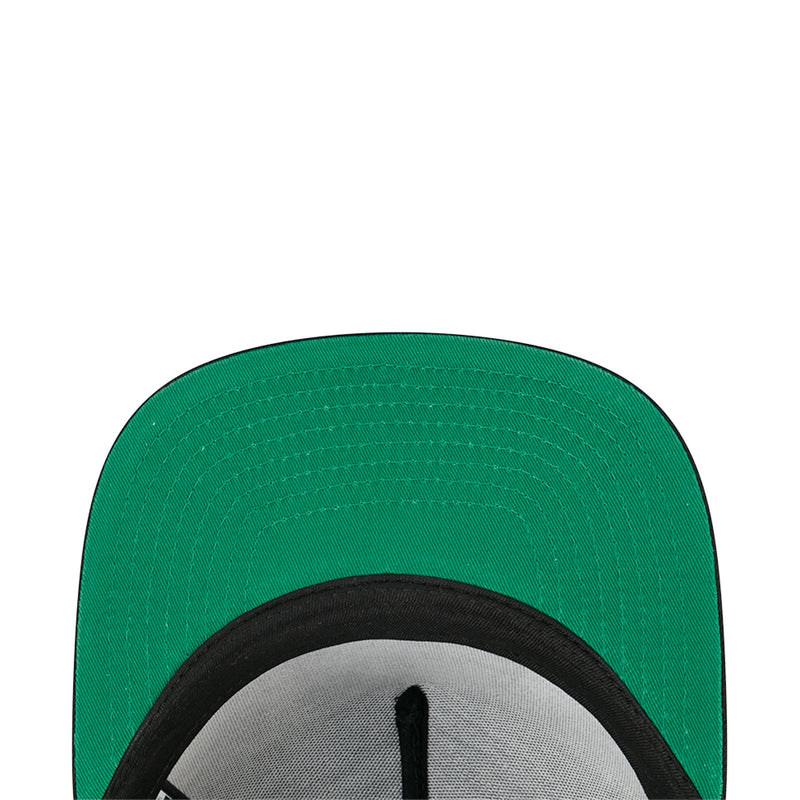 Green interior panel with black brim trim of a baseball cap