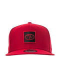 Red baseball cap with black square SF logo patch and curved brim
