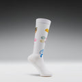 White sock with colorful symbols on a gray background