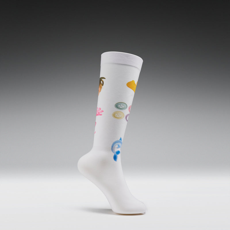 White sock with colorful symbols on a gray background