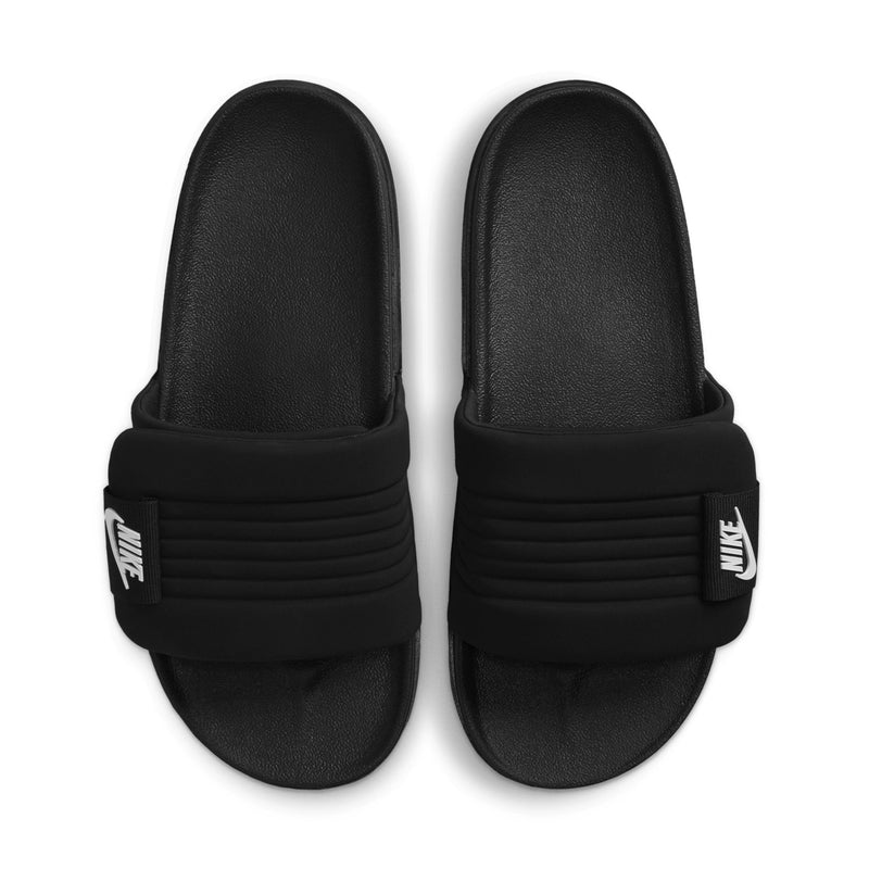 Pair of black slide sandals with contoured footbeds and NIKE logos