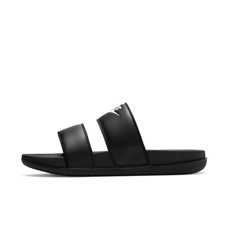 Women's black Nike slide sandals, open-toe two-strap design on flat outsole