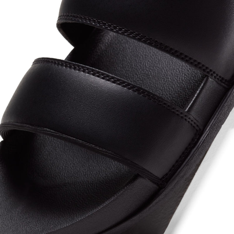 Women's black slide sandal strap with stitched band and smooth leather-like texture