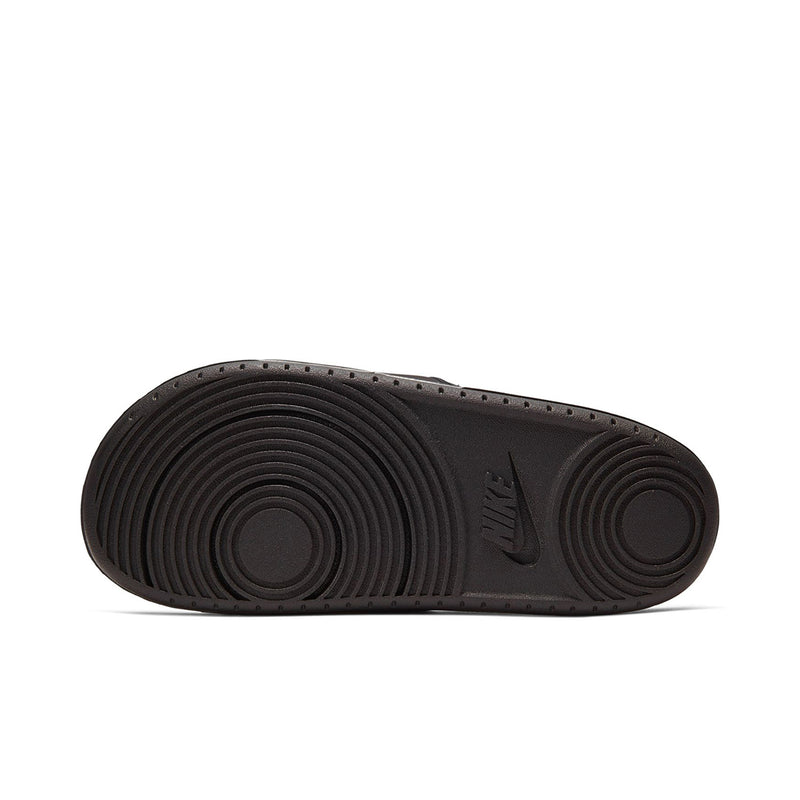 Men's slide sandals outsole, textured tread with small logo at center
