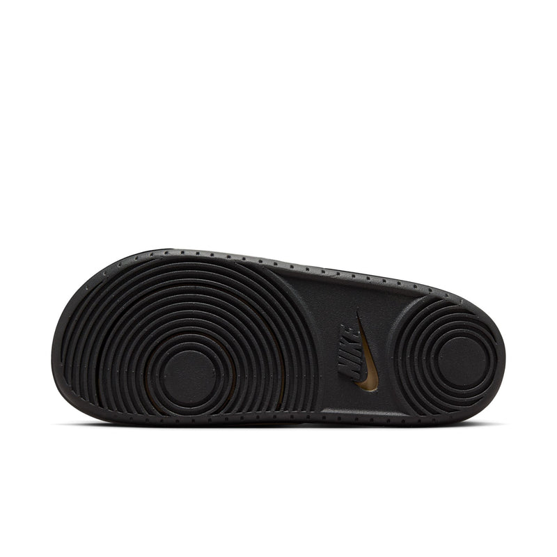 Black rubber outsole for men's Nike slide sandals with circular tread pattern