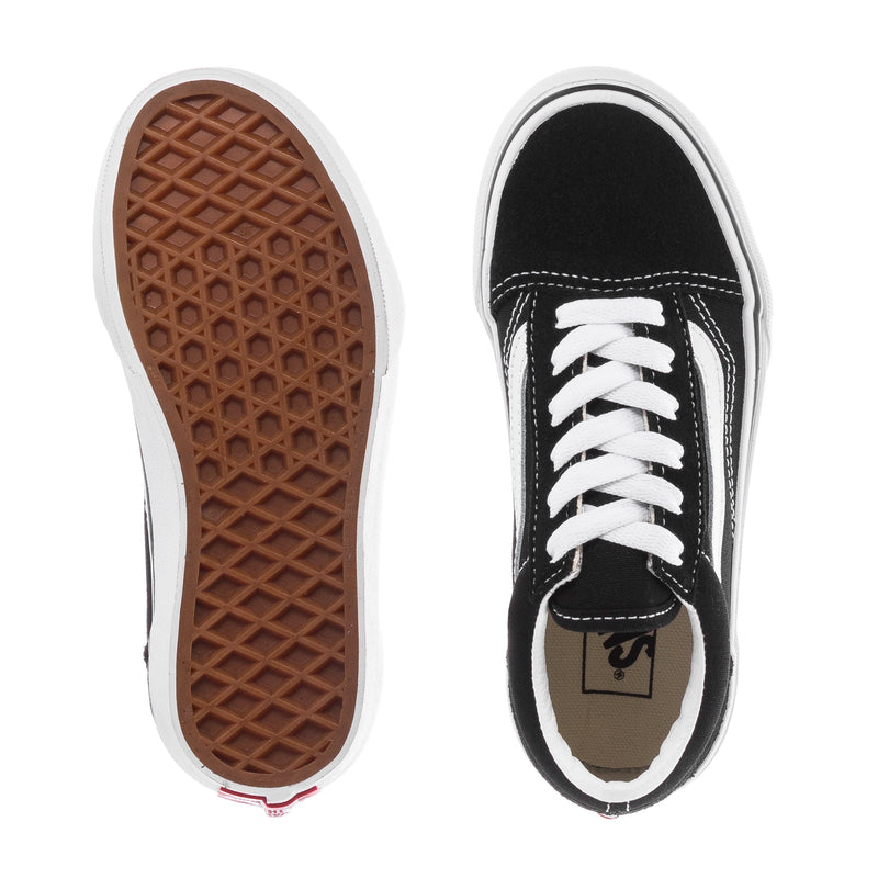Kids sneakers with white midsoles and tan/black waffle tread outsole