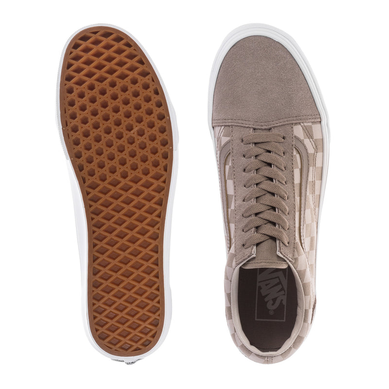 Men's low-top skate sneaker outsole and heel view, tan gum tread and beige lining