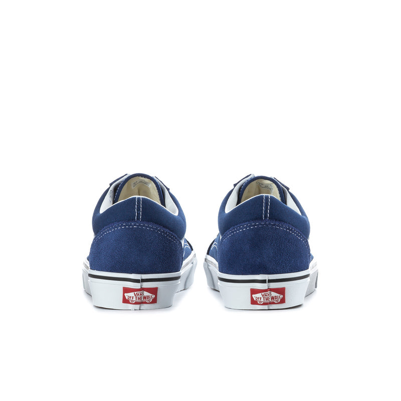 Blue low-top sneakers heel view with white rubber sole and heel label