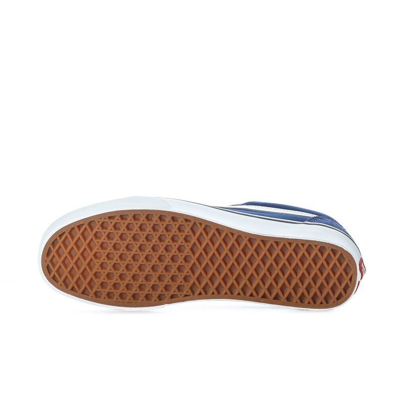 Blue sneaker outsole view with textured rubber tread and light sidewall