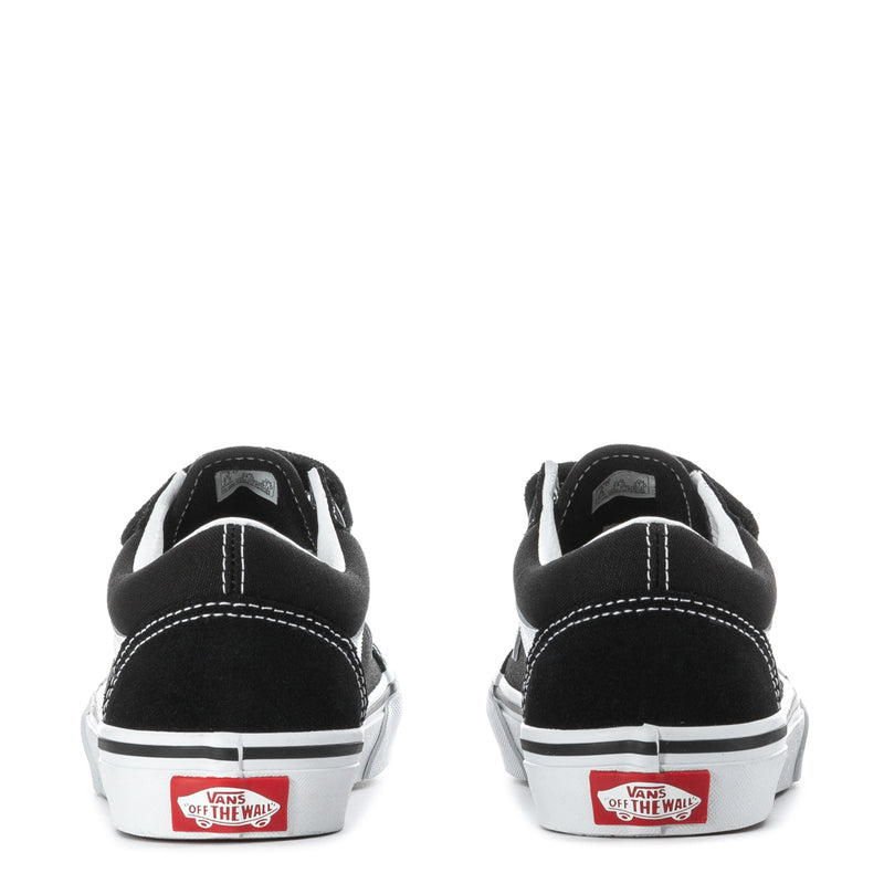 Kids' black Vans sneakers with white heel stripe and 'Off the Wall' logo patch
