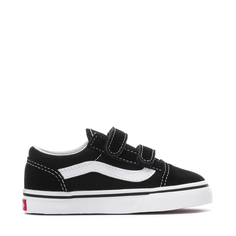 Toddler low-top sneaker with black upper, white wavy stripe, and Velcro closure